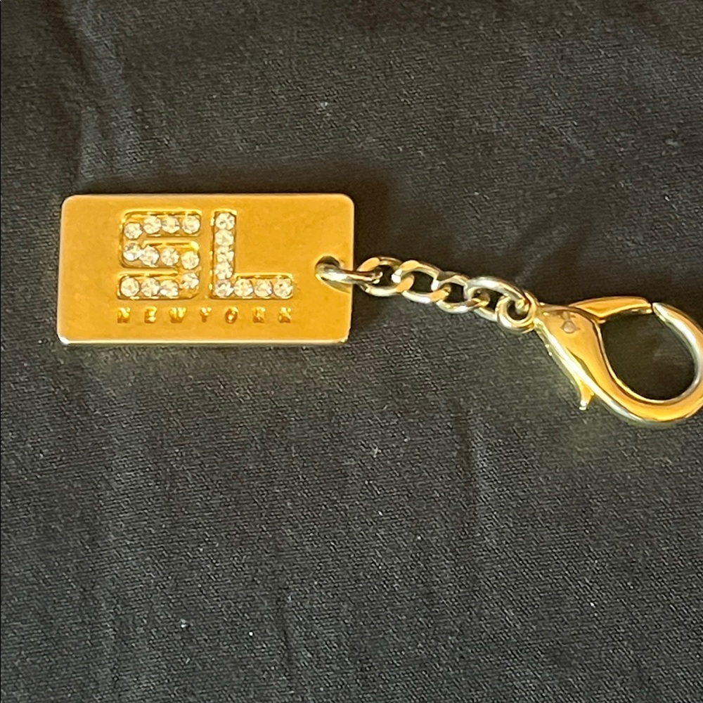 SL New York Gold Tone & Rhinestones Keychain Used